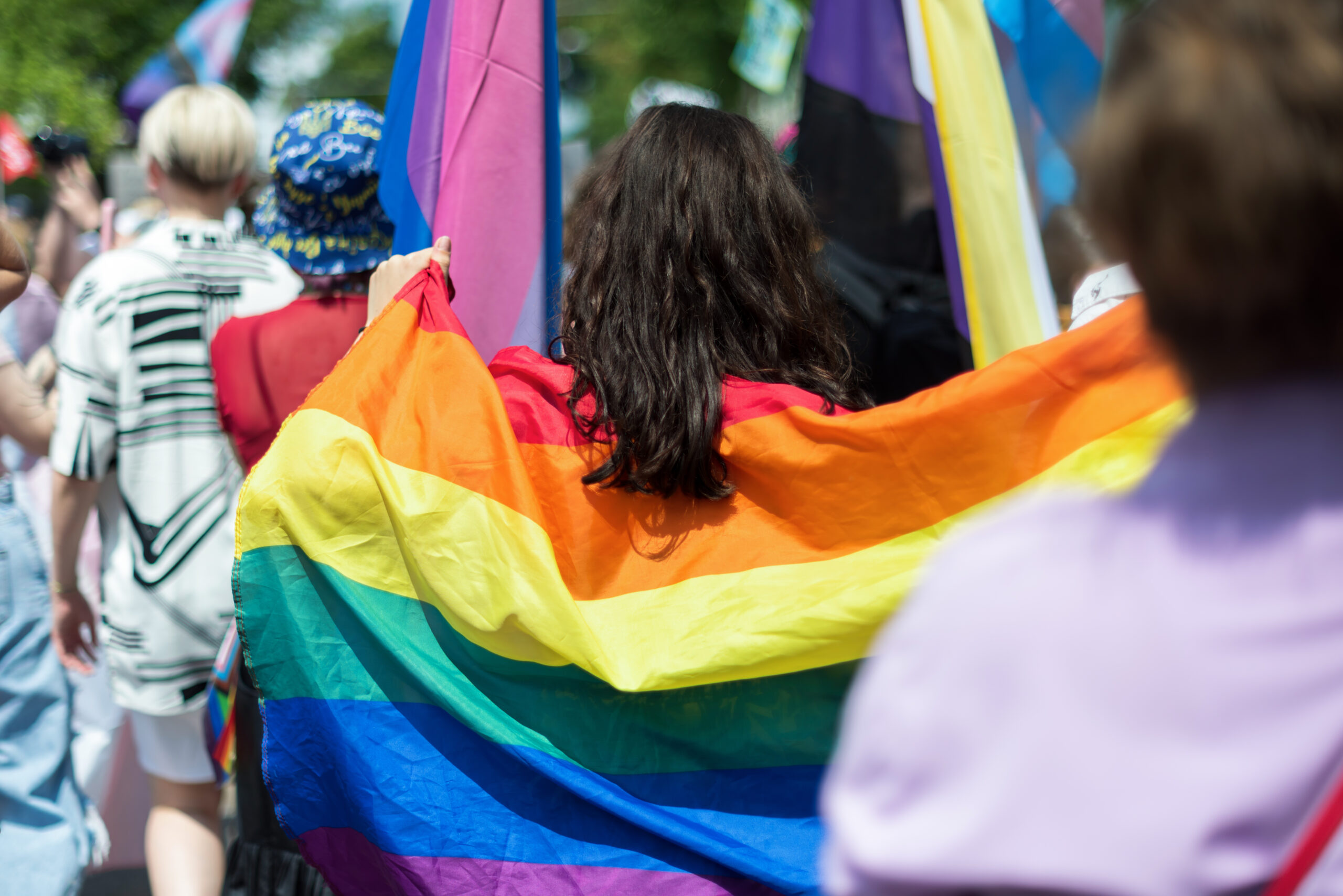 Pride parade in center of the city Chisinau, Moldova. People with queer flags